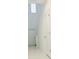 Bright entryway with high ceilings, white walls, and a view of the staircase at 2847 Big Sur Rd, Davenport, FL 33837