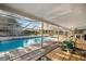Indoor pool with translucent roof, ideal for swimming and relaxation year-round at 1910 Sylvester Ct, Lakeland, FL 33803
