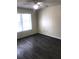 Bedroom with dark tile flooring, a ceiling fan and natural light from the window at 709 Secret Harbor Ln # 313, Lake Mary, FL 32746