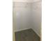 Walk-in closet with wire shelving and tile flooring at 709 Secret Harbor Ln # 313, Lake Mary, FL 32746