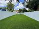 Spacious fenced backyard with lush green lawn at 808 Edgewater Dr, Orlando, FL 32804