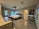A spacious bedroom with lots of natural light, tile floors, and plenty of closet space at 808 Edgewater Dr, Orlando, FL 32804
