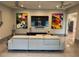 Modern living room with stylish decor, contemporary furniture, and unique artwork on the walls at 808 Edgewater Dr, Orlando, FL 32804