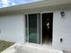 Sliding glass door leading to back patio with view to interior at 1737 N Lakewood Ave, Ocoee, FL 34761