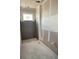New construction shows the bathroom with a window and shower surround ready for tile and customization at 2359 Zuni Road, St Cloud, FL 34771