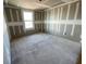 Unfinished bedroom displaying prepped walls, ready to be transformed into a cozy space at 2359 Zuni Road, St Cloud, FL 34771