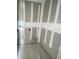 New construction shows the bare drywall and rough layout of this spacious laundry room, ready for appliances at 2359 Zuni Road, St Cloud, FL 34771
