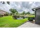 Enjoy the pond views from this home's landscaped backyard at 609 Casa Park N Ct, Winter Springs, FL 32708