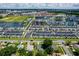 Stunning community with modern townhomes, picturesque lakes, and resort-style amenities in a desirable location at 5008 Vanguard St, Orlando, FL 32819