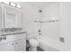Updated bathroom with granite vanity, subway tile backsplash, and shower/tub combo at 5008 Vanguard St, Orlando, FL 32819