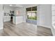 View of modern kitchen area leading to a patio through sliding glass doors at 5008 Vanguard St, Orlando, FL 32819