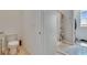 Bathroom featuring toilet, shower and open doorway at 623 Grove St, Winter Haven, FL 33881