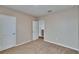 Cozy bedroom featuring neutral paint, carpet flooring, and a walk-in closet at 623 Grove St, Winter Haven, FL 33881