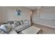 Comfortable bonus room with plush seating and stylish decor at 623 Grove St, Winter Haven, FL 33881