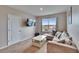 Cozy bonus room with a large window and modern entertainment setup at 623 Grove St, Winter Haven, FL 33881
