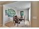 Elegant dining room features a stylish table set, artwork, and neutral tones for a warm ambiance at 623 Grove St, Winter Haven, FL 33881