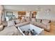 Bright and airy living room with view of kitchen and dining area at 623 Grove St, Winter Haven, FL 33881