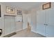 Cozy office space with neutral tones, a whiteboard, and a large display case at 623 Grove St, Winter Haven, FL 33881