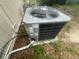 Outdoor AC unit for the house. The unit is outside on a concrete pad at 7175 Se 123Rd Pl, Belleview, FL 34420