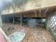 Crawlspace with dirt floor and some debris with the foundation viewable at 7175 Se 123Rd Pl, Belleview, FL 34420