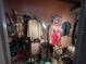 Well-organized closet with clothing racks and shelving at 7175 Se 123Rd Pl, Belleview, FL 34420