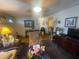 Bright living area with a blend of textures and decor at 7175 Se 123Rd Pl, Belleview, FL 34420
