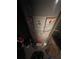 Close up of an automatic storage water heater with visible labels and safety warnings at 7175 Se 123Rd Pl, Belleview, FL 34420