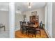 Traditional dining room with hardwood floors and ample space for Gathering gatherings at 116 Winding Oaks Ln, Oviedo, FL 32765