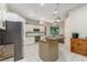 Well-equipped kitchen features stainless steel appliances, granite countertops, and ample cabinet space at 116 Winding Oaks Ln, Oviedo, FL 32765