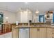 Kitchen featuring granite countertops, stainless appliances and eat-in breakfast nook at 116 Winding Oaks Ln, Oviedo, FL 32765