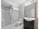 Bathroom featuring vanity, mirror, shower, and toilet at 530 S Eola Dr, Orlando, FL 32801