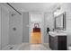 Bathroom with black and white tile shower and sink at 530 S Eola Dr, Orlando, FL 32801