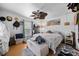 Cozy bedroom featuring a ceiling fan, wood floors and lots of natural light at 530 S Eola Dr, Orlando, FL 32801