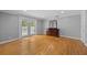 Open bedroom showcases hardwood floors, ceiling fan and french doors at 530 S Eola Dr, Orlando, FL 32801