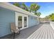 Outdoor deck with chair and multiple doorways to house at 530 S Eola Dr, Orlando, FL 32801