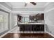 Elegant kitchen features dark cabinets, marble countertops, and an eat-in bar at 530 S Eola Dr, Orlando, FL 32801