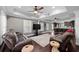 Comfortable living room features hardwood floors, ceiling fans, and views of the kitchen at 530 S Eola Dr, Orlando, FL 32801