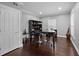 Bright office features hardwood floors, built-in shelving and a large table at 530 S Eola Dr, Orlando, FL 32801