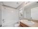 Bathroom featuring a tub-shower combination, a white toilet, and a single-sink vanity at 4034 Winding Vine Dr, Lakeland, FL 33812