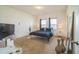 Bright bedroom with a comfortable bed, soft lighting, and elegant decor creating a serene atmosphere at 4710 Osprey Way, Winter Haven, FL 33881
