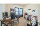 Functional bedroom with a bed, study area, and window, ideal for a or teenager's space at 4710 Osprey Way, Winter Haven, FL 33881