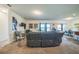 Bright and airy living room showcasing comfortable seating, contemporary decor, and an open layout at 4710 Osprey Way, Winter Haven, FL 33881