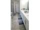 Bathroom featuring a shower and double sinks at 1704 Felicity Ln, Kissimmee, FL 34744