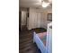 Bright bedroom featuring hardwood floors and a spacious closet for ample storage at 1704 Felicity Ln, Kissimmee, FL 34744