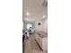Eat-in kitchen with an island, dining table, and natural light at 1704 Felicity Ln, Kissimmee, FL 34744
