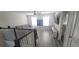 Upstairs living space with a sofa and TV, perfect for relaxation and entertaining at 1704 Felicity Ln, Kissimmee, FL 34744