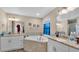 Large bathroom space with soaking tub and dual vanities at 311 Bentley Oaks Blvd, Auburndale, FL 33823