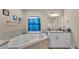 Relaxing primary bathroom with soaker tub and vanity at 311 Bentley Oaks Blvd, Auburndale, FL 33823