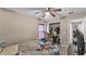 Bedroom with large window and ceiling fan at 311 Bentley Oaks Blvd, Auburndale, FL 33823