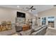 Bright and airy living room with backyard access at 311 Bentley Oaks Blvd, Auburndale, FL 33823